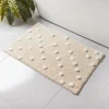 BATHROOM COLLECTION Tapis de bain pois blanc